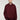 Men's oversized burgundy jacket with a collared neck, featuring side pockets, styled with black pants.